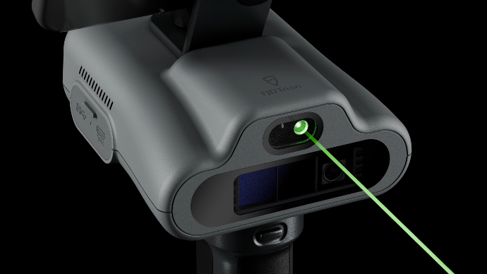 C1 scanner emitting green laser beam – precision 3D scanning sensor close-up
